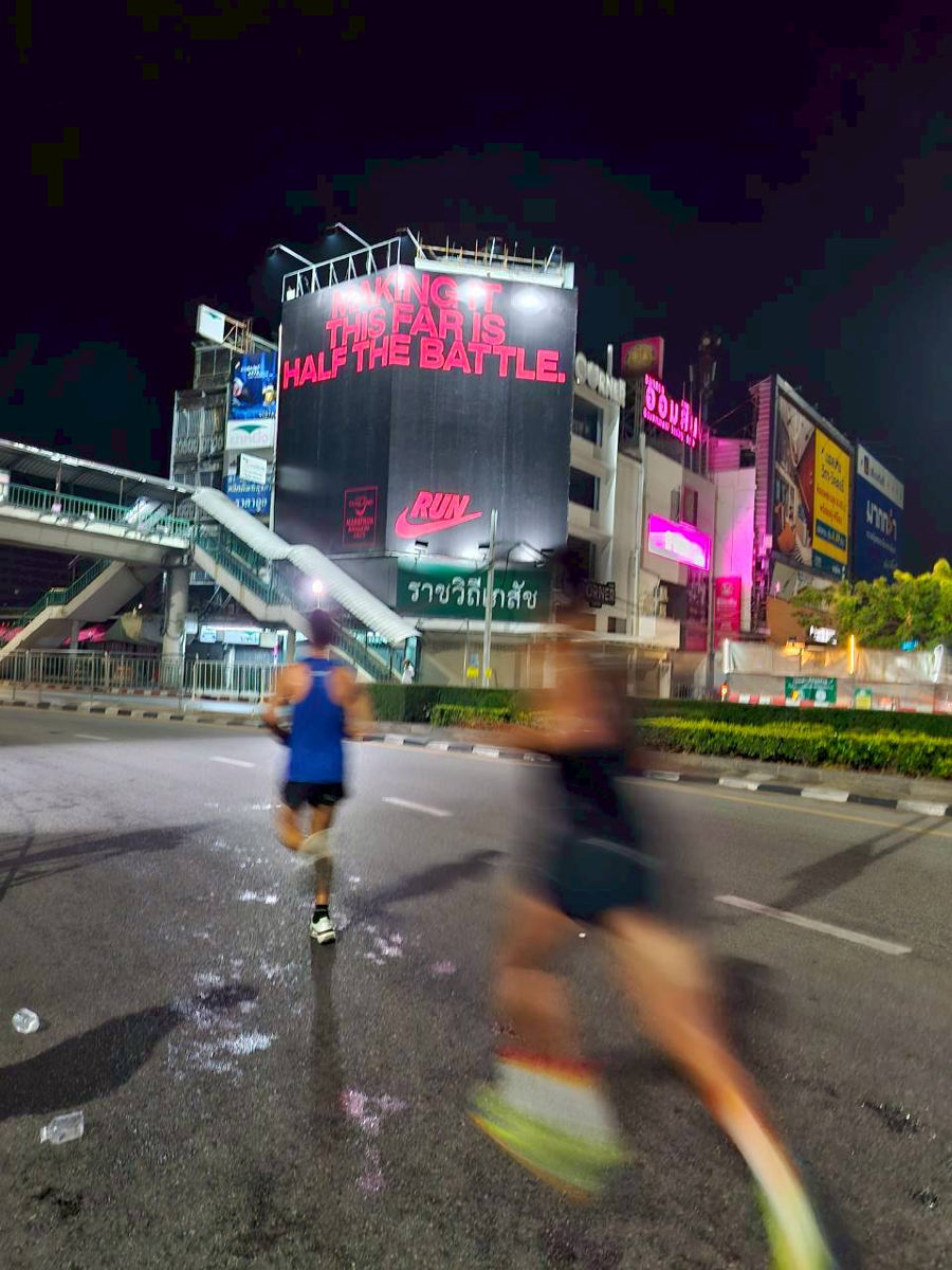 Nike night billboard with runners